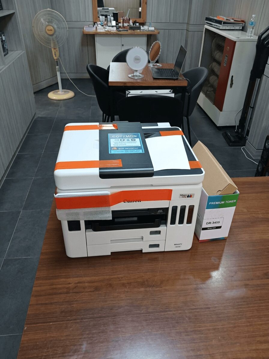보호 테이프가 부착된 캐논 GX7192 정면